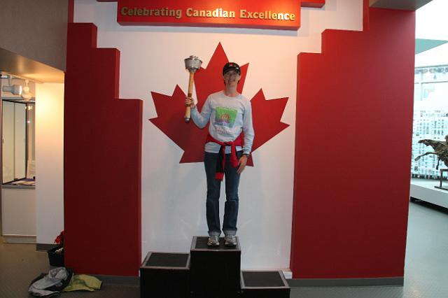 IMG_3119.JPG - Joyce poses with the '88 Calgary Olympic Torch.  The torch was modelled after the Calgary Tower.