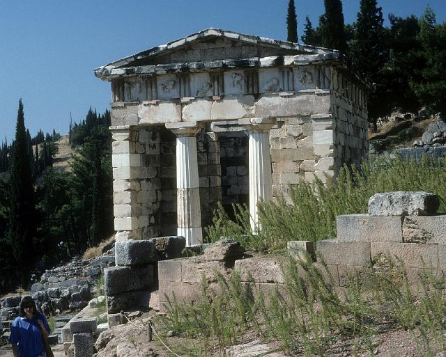 greece0040.jpg - Treasury of the Athenians at Delphi - c500BC, reconstructed 1903-1906.  This was build to honor Apollo.