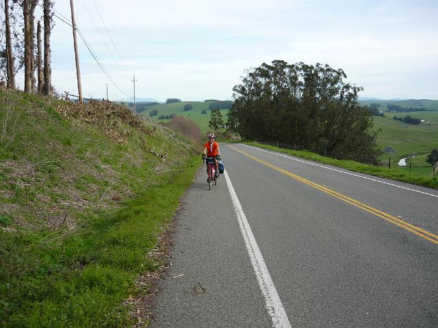 P1000181.JPG - Climbing up a very steep hill.  Joyce is walking up ahead of me.