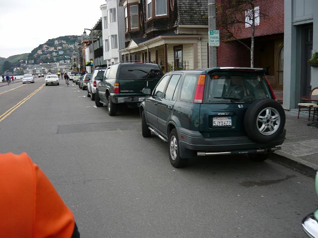 P1000200.JPG - Passing through Sausalito, CA.  Note all the bikes on the road.